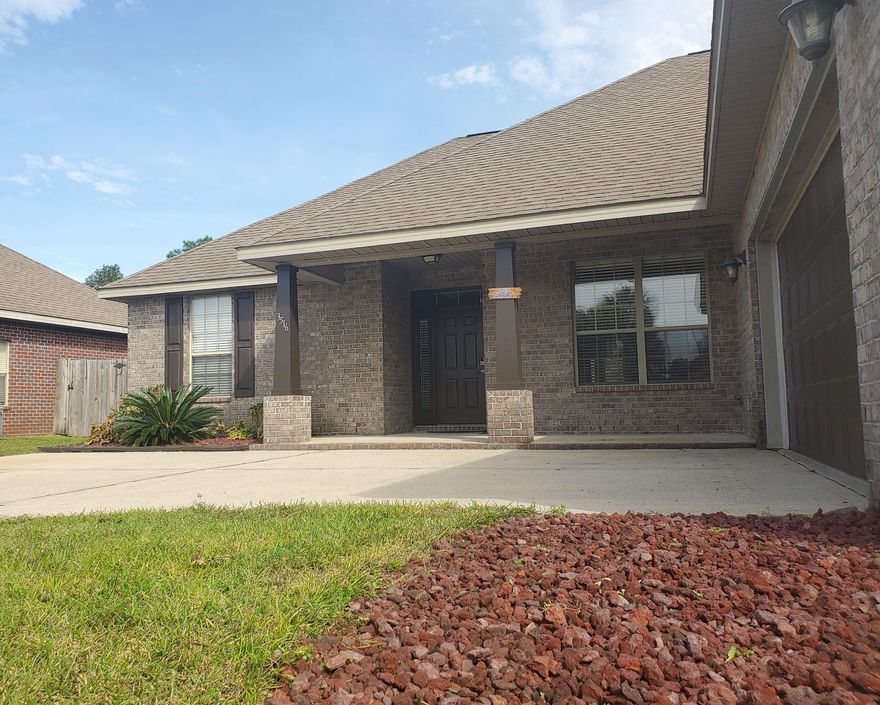 This beautiful home has many features for outdoor activities and entertaining. Greet guests from the open porch that overlooks a newly sodded front yard. The front of the house offers a side-entry garage and landscaping features including lava rocks and a new pump irrigation system, while the backyard has a privacy fence and patio. The open floorplan and high ceilings create a spacious area in the living room great for entertaining. The kitchen offers a breakfast bar and overlooks the living room. The house includes a new A/C unit and new vent pipe seals on the roof. The property is just a short drive from restaurants, shopping, & beach access in Navarre, along with easy access to Interstate 10 and Highway 98. More pictures to come soon.
