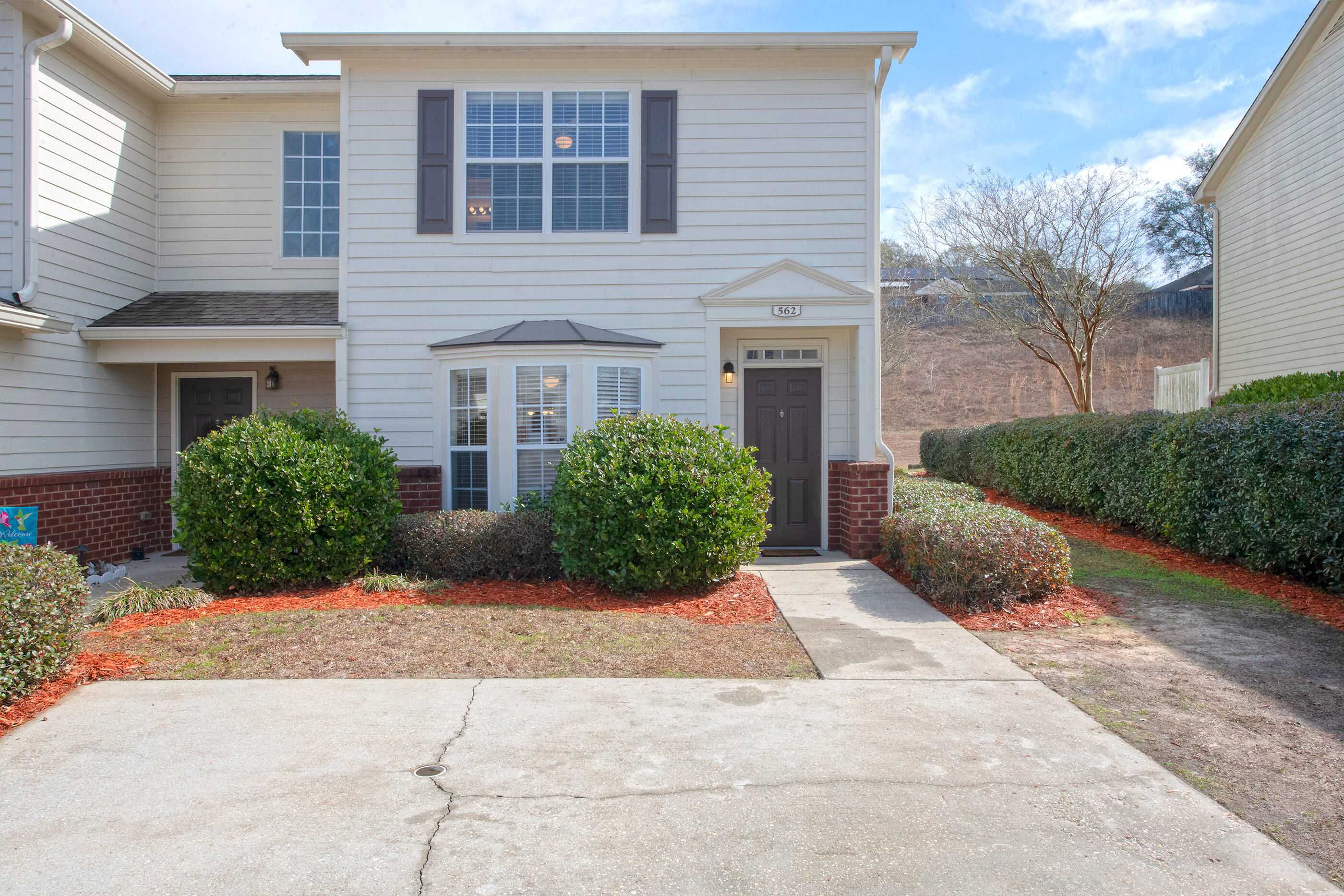 WHO WANTS 2 MASTER SUITES AND A POOL? This townhome will accommodate! Located in Crestview's only TH complex, south of I-10, with a community pool-- this unit boasts one of the more spacious floorplans offered. It's also one of the few 'end units' currently available (only one shared wall)! This 2 BR/ 2 1/2 bath home features 2 MASTER SUITES.. WITH HUGE WALKIN CLOSETS. The owners also installed BRAND NEW FLOORING in both master baths. This property is conveniently located across from guest parking.. which means extra parking space is available when entertaining. It's also very close to the community pool and mailbox station. Newer HVAC.. and an additional $6000 in upgrades! This one was a long-term lucrative investment property. Priced to move. Make an offer today!