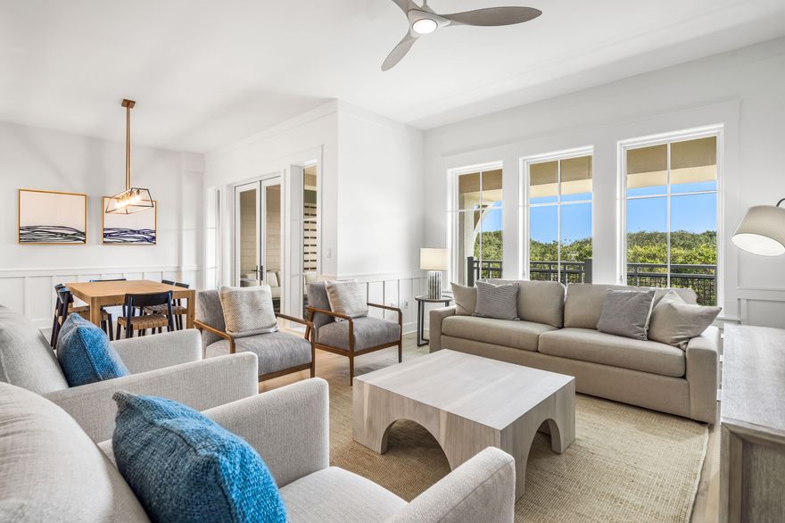 Find modern perfection at this newly and completely renovated two-level 3BR/3.5BA residence plus office and bunk room in the coveted Compass Point II building in WaterSound Beach. Nestled alongside the towering dunes, enjoy the sounds and smells of the Gulf from balconies with picturesque views, all just steps along a dedicated boardwalk to one of the most breathtaking beaches in the area. Impeccably updated, the interior has been reimagined with new paint, hardware, lighting, cable stairway railings, window treatments, refinished hardwood floors, and more. The reverse floor plan offers an open living and dining space that exudes elegance with custom artwork and designer furnishings. Accessed from this space, the large balcony provides additional space to relax and soak in the beach breeze. Highlights of the beautifully appointed kitchen include ample storage and workspace with custom cabinetry, a pecky cypress hood accent, quartz countertops, a lowered counter height bar, and new stainless-steel appliances. A closet was expertly converted to an additional bar area with custom cabinetry, pecky cypress accent wall, floating shelves, and a refrigerator drawer set between bar cabinets. Two comfortably sized guest rooms with fully updated ensuite bathrooms and a powder room are also located on this level. The first level primary suite is a serene retreat with private screened porch and a stunning ensuite with dual vanity, separate soaking tub, and a glass enclosed tiled walk-in shower. A custom bunk room was added in the downstairs hallway including custom niches per bunk with charging ports, separate lighting for each bunk, and custom shelving/storage areas. The separate office area has new counters, painted cabinets, and updated cabinet hardware. The attached garage provides excellent storage along with easy access to the unit. 
 
The enchanting community of WaterSound Beach is located south of Scenic Highway 30A offering homeowners a rare sense of seclusion yet with easy access to area activities. Amenities include gated entry, swimming pools, a puttering park, community green spaces, a state-of-the-art fitness center, and private access to one of the most beautiful coastlines in the area with towering white sand dunes and winding wooden boardwalks.
