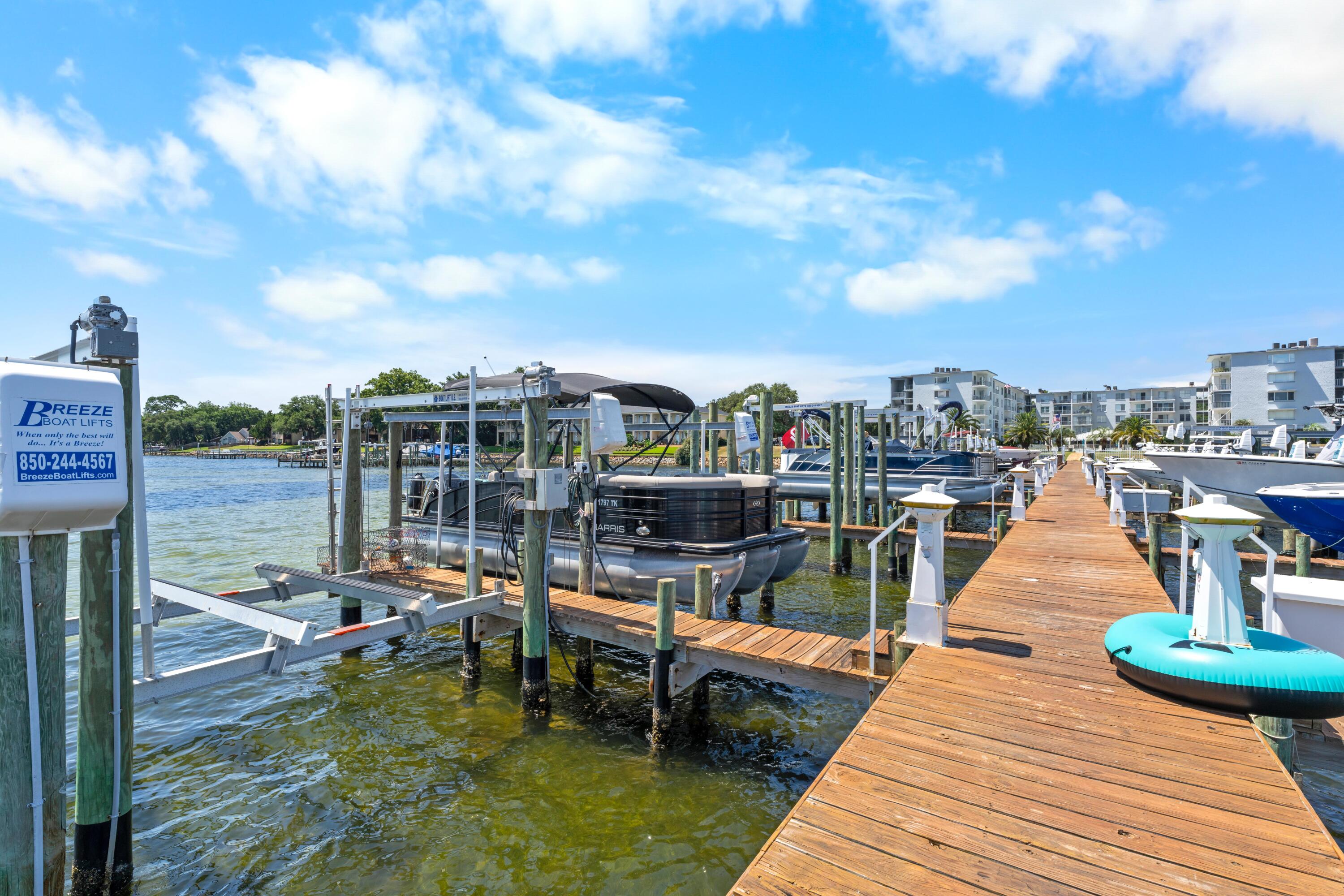 Remodeled Bayfront Condo with Deeded Boat Slip & Lift - Century Park WestExperience the best of coastal living in this fully remodeled 2-bedroom, 2-bath condo at Century Park West on the beautiful Choctawhatchee Bay. This maintenance-free residence includes deeded boat slip 11E, exclusively assigned to Unit 416, featuring an 8,000 lb-rated boat lift that accommodates up to a 26-foot boat. The private dock is secured by passkey access. Valued at approximately $60,000, the boat slip can be sold or rented to another owner or tenant within the community, with estimated rental income of $400/month -- a rare and valuable investment opportunity. Inside, the condo shines with brand new stainless steel Frigidaire appliances, luxury vinyl plank flooring with a lifetime warranty, new plumbing, a new water heater, and a new HVAC system with a 12-year warranty. The spacious primary suite offers balcony access with serene views of the bay and bayfront pool.
Both bathrooms have been fully updated with new vanities, plumbing, and fixtures, while the primary bath features a beautifully tiled walk-in shower. Additional features include on-site laundry, private storage on the same floor, and spacious closets throughout.
Whether you're searching for a full-time home or a lock-and-leave waterfront retreat, this updated condo delivers carefree bayfront living with unmatched boating access and exceptional value