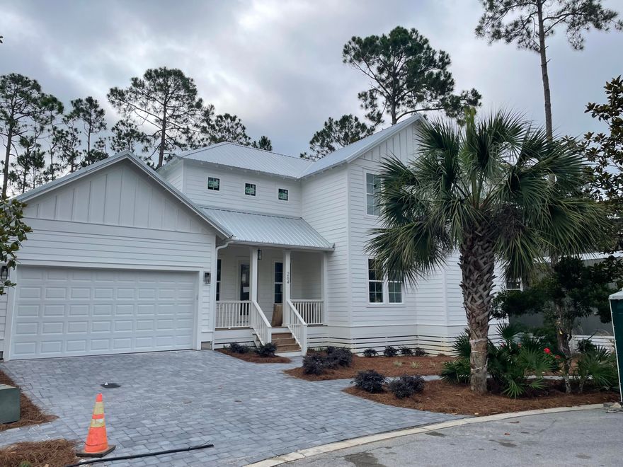 Beautiful new home in the gated neighborhood of Hidden Grove.  House is four bedrooms and three & half baths.  Bathroom floors will be tile with tile shower and glass enclosures.  LVP Flooring throughout Remainder of Home.  First Floor Ceilings 10 feet and 9 feet on Second Floor.  The master bedroom is located on first floor with custom walk-in closet.  The lot has a large back yard w ton of privacy.  Hidden Grove is a Rental Restricted Neighborhood located in Flood X.