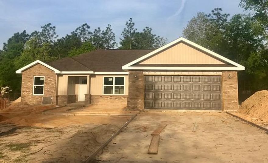 THIS 4 BEDROOM 2 BATH HOME IS ON A LARGE FLAT LOT!!! LOW COUNTY TAXES. VA APPROVED & 2015 PARADE OF HOMES AWARD WINNING BUILDER.Dover White Kitchen Cabinets, Stained Chocolate Brown Master and Guest Bath Cabinets Stainless Steel Appliances, Smooth Top Range, SS Dishwasher and Microwave, Rustic Flooring Throughout the Living Room, Kitchen and Bathrooms, Bedrooms have been upgraded to Frieze Carpet. 2 Car Garage with Automatic Opener, Garage is painted and has baseboards. ALMOST 1600 SQ FT BUT FEELS MUCH LARGER WITH VAULTED CEILINGS IN THE LIVING ROOM AND TREYED CEILING IN THE MASTER. YARD WILL BE PROFESSIONALLY LANDSCAPED. ! PRELIMINARY INSURANCE ESTIMATE IS $550.00 PER YEAR, AND LOW COUNTY TAXES. SELLER WILL ASSIST WITH CLOSING COSTS.