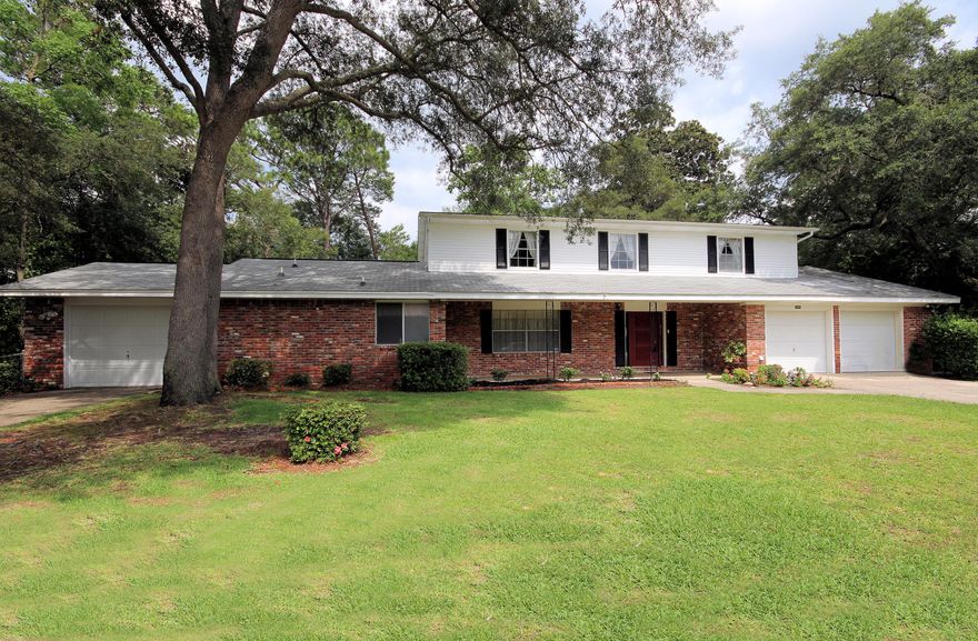 KENWOOD! Need lots of space? Look no further...six bedroom homes are hard to find (notice room sizes). Original owner home next to Kenwood Elementary with all the conveniences and amenities the Kenwood area has to offer. Sidewalks, wonderful neighborhood, convenient to shopping, major medical care and equally handy to Eglin or Hurlburt (Duke Field and Army Base are a 20 min drive). Master suite (downstairs), sunroom and additional one car garage were added in 1991. The master bath features elevated marble whirlpool tub, separate walk-in shower, double vanity and walk in closet. This bedroom is conveniently located close to the laundry room and entrance to 3rd garage.