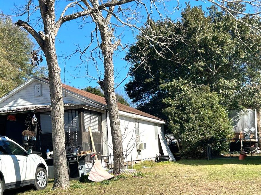 REDUCED! Home in city limits of Geneva, AL.  Walking distance to stores and town.  Only hour away from sugar white sands of Santa Rosa Beach.  Just minutes from Florida line.  Home is presently being used as rental.  Selling as is.  Appliances and two window A/C's do not stay. Roof needs to be replaced. Apply your creative talent to this older frame home to make it shine again!