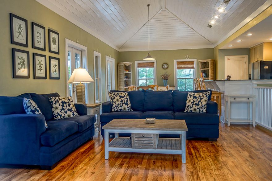 ''Seaquell'' is tucked perfectly behind the trees in Magnolia Cottages, with a cathedral ceiling spanning the second floor's open living plan. *Exterior just freshly painted* This 3 bedroom, 3.5 bath home is one of the largest plans in Magnolia Cottages. Including hall bunks & an ensuite bathroom in all 3 bedrooms. Home expresses coastal cottage flavor with hardwoods throughout, tiled & beadboarded bathrooms & crosshatched interior doors. The community pool is just moments away & just across 30A is the neighborhood's deeded beach access. Decks & balconies expand life to the outdoors including a Master Bedroom walkout to a private deck. Shops & dining of Alys & Rosemary Beach are within easy reach on Scenic 30A. *Currently asking lowest price per sqft in community.* Don't miss out.