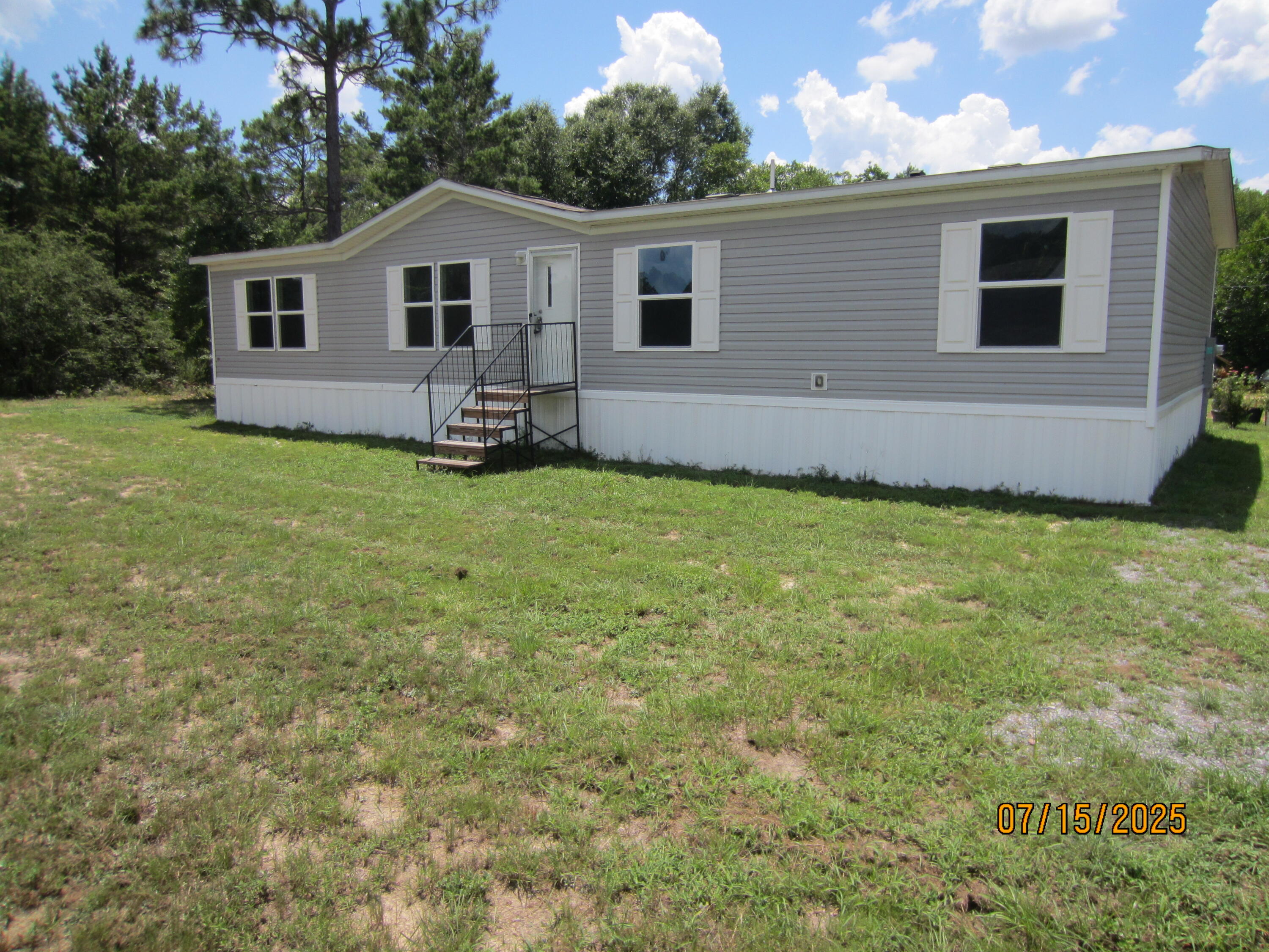 NEW home ready for your immediate enjoyment. This 4BR & 2BA home is brand new with split bedroom design. All new appliances. This great location is convenient to Crestview, Niceville and DeFuniak Springs. This home qualifies for FHA/VA financing to a qualified buyer. The new home has a Manufacturer's Warranty. Closing to be at Mitchell Land & Title with convenient locations in DeFuniak Springs & Freeport. SEE YOUR NEW HOME TODAY.