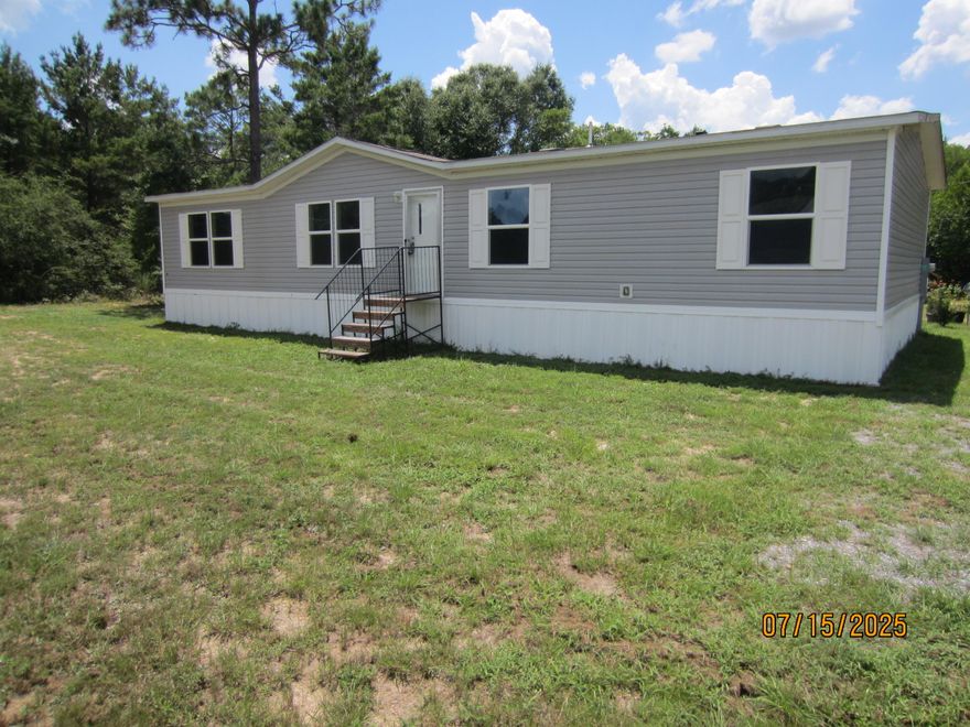 BIG PRICE REDUCTION. OWNER SAYS SELL. NEW home ready for your immediate enjoyment.  This 4BR & 2BA home is 'Brand'new with split bedroom design.  All new appliances. This great location is convenient to Crestview, Niceville and DeFuniak Springs. This home qualifies for FHA/VA financing to a qualified buyer. Check out also the HOMETOWN HEROS Program for closing assistance if qualified.  The new home has a Manufacturer's Warranty. Closing to be at Mitchell Land & Title with convenient locations in DeFuniak Springs & Freeport.  SEE YOUR NEW HOME TODAY.