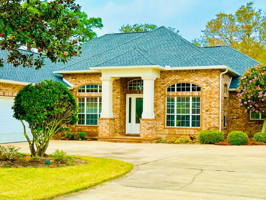 Beautiful 4BD 3BTH home in gated community MAGNOLIA PLANTATION. THREE CAR GARAGE with NEW EPOXY FLOOR installed 2020. NEW ROOF installed 2021. 14 FOOT CEILINGS in entry & dining room. Great room & pool deck has SURROUND SOUND SYSTEM.  Sliding doors to pool deck fold all the way back. SALT WATER POOL & HOT TUB.  Outdoor shower.  Custom kitchen with granite counter tops, stainless appliances, a gas cook top, and custom hood. LARGE MASTER BEDROOM with Hunter Douglas PLANTATION SHUTTERS, sitting area, tray ceiling and TWO walk-in closets.  The Master bath has a KOHLER WHIRLPOOL TUB for two, WALK-IN TILE SHOWER with seat. Whole house central vacuum system.  The former golf course fairway located behind the home may be available to purchase by the home owner in the future.