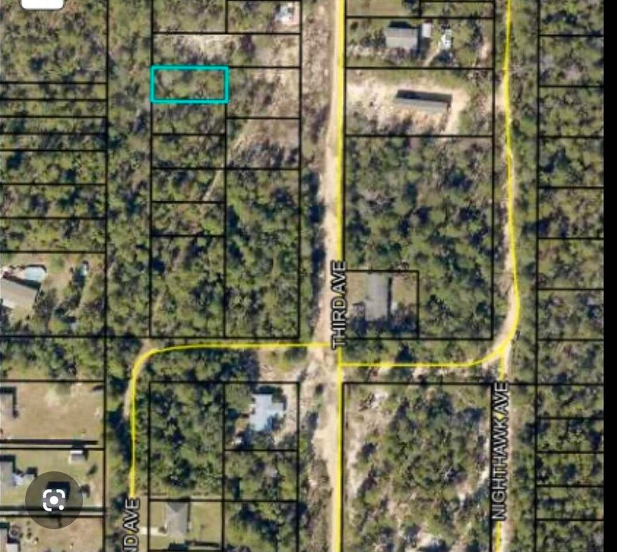 Mostly cleared lot to fit a mobile home.