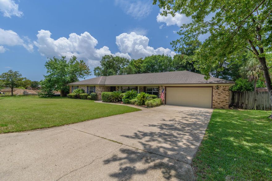 Nestled in a cul-de-sac on the community of Lake Charlene, this Ranch style home offers a gorgeous completely renovated kitchen with a butlers pantry and a swimming pool. You'll enjoy two separate living spaces and a formal dining room with a wood burning fireplace in the living room. The kitchen comes equipped with granite countertops, beautiful cabinetry providing abundant storage, stainless steel appliances with a built-in microwave and electric cooktop, fridge with ice and water dispenser and a butlers pantry with wine storage/additional cabinet storage with a breakfast nook. Just beyond that you'll find the convenient powder room for guests. The 4 bedrooms and 2 bathrooms are located on the opposite end of the house allowing for privacy. Both bathrooms have wonderful updates with new