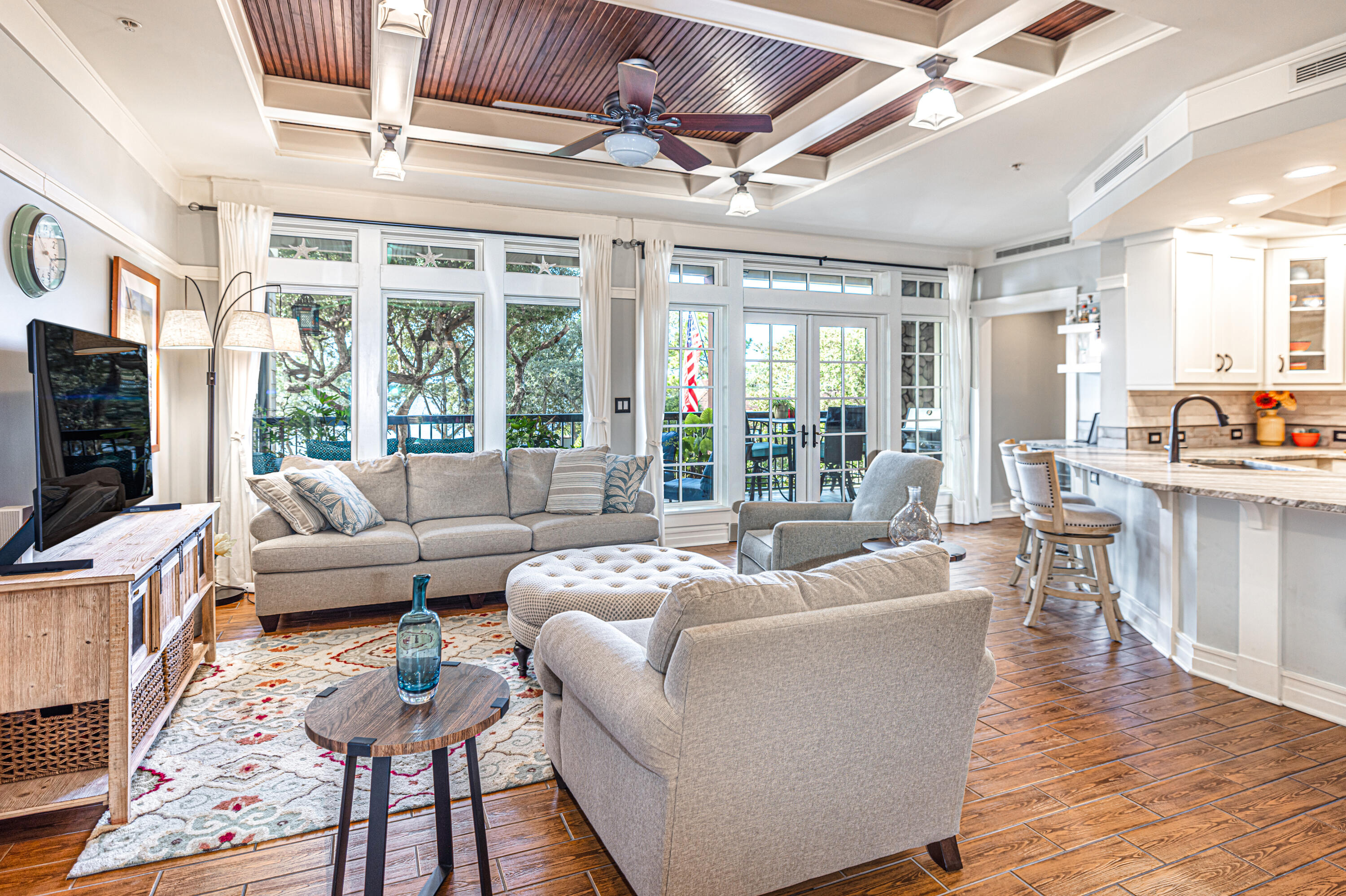 Luxury lakefront and location blend perfectly in this stunning craftsman style condo end unit. Overlooking Lake Powell, Florida's largest coastal dune lake in gated Wild Heron just minutes away from the Gulf of Mexico. There is meticulous attention to detail in every design decision of this spacious three bedroom, three bathroom condo. Custom features that are handpicked include a stunning center island breakfast bar with leathered texture; stainless appliances; viking gas stove; dry bar with wine refrigerator; beautiful custom cabinetry; a large walk-in pantry with butler's sink and custom shelving; permanent grill; and front-end washer and dryer. The large dining room and spacious living room are perfect for entertaining. In addition, the tile throughout shows like hardwood with tongue and groove coffered ceilings in the main living area.
It is easy to lose yourself with the lake views as your make your way to the primary bedroom suite with southwestern views. The primary bedroom suite is a retreat with French doors that open up to a private balcony overlooking Lake Powell. The primary bathroom suite offers double vanities, a luxurious jetted tub, a steam room and shower combo, ample custom cabinetry and a large walk-in closet. There are two guest bedrooms with two additional baths that offer plenty of room and privacy in a split plan.
Lakeside Lodge condos are hidden gems located within Wild Heron, which is a gated community, surrounded by the Sharks Tooth gold course, a Greg Norman designed masterpiece. There are two other golf courses including Watersound, and a new 18 hole golf course with Watersound memberships available offering additional amenities. Parking is conveniently located underneath the building for easy access and the condo is on the first floor, so you only have to go up one flight of stairs to get to the condo.
Wild Heron has world-class amenities which including: 24 hour security and gated access, walking trails to Watersound Origins, two pools, hot tubs, fitness center, boathouse with canoes and kayaks for residents to use, a covered picnic area with fireplace, and a fire pit with seating. This complex offers it's own private pool and library.
You are a short drive to the Gulf of Mexico, Pier Park, Lake Powell Park, 30Avenue for shopping and entertainment, Camp Helen State Park, and Rosemary or Alys Beach.