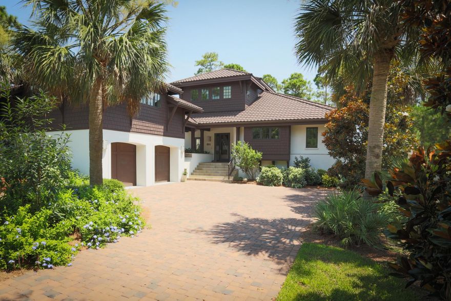 Retreat to paradise in this stunning home on Draper Lake overlooking the Gulf of Mexico! Ideal for those who desire the relaxed, outdoorsy 30-A lifestyle yet who are not willing to compromise on quality, this impeccable 6-bedroom, 6-1/2 bath home combines superb craftsmanship, an eye for artistry, and a passion for the very best. The living/kitchen/dining area features gorgeous views, an open floor plan for entertaining, a Tabbystone fireplace, English Walnut travertine flooring, hard maple cabinets and bookshelves custom made by Hampshire Cabinets in Ohio, solid surface countertops, and artistic, modern fixtures. Also on the main level are the master suite, with more great lake/gulf views; an office area; and balcony seating overlooking the custom-designed, heated salt water pool,