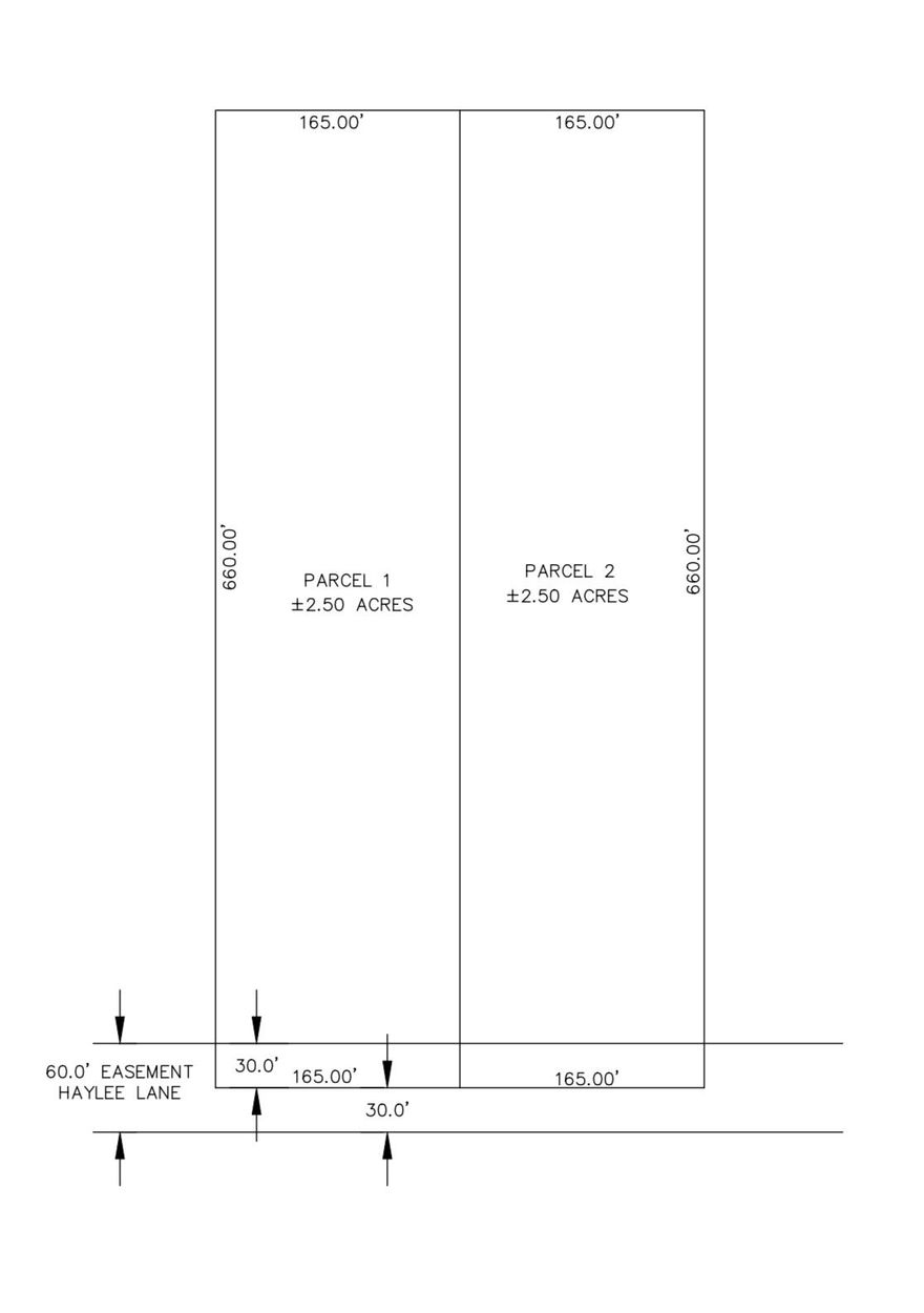 Convenient to town, this 2.51 acre wooded parcel is ready and waiting for your dream home. Bring your house plans and get started making it your very own. Sale of property is contingent upon lot split with the county. Buyer to verify all areas of importance.