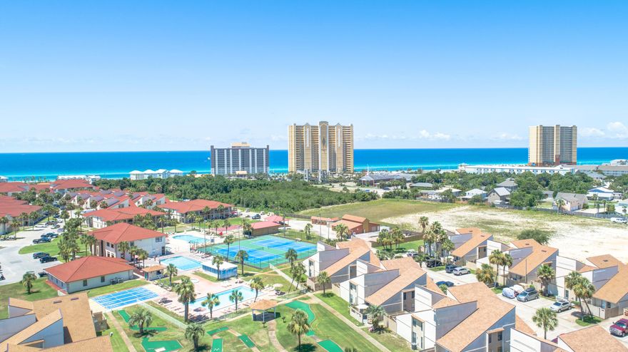 Looking for a home that offers endless activities? Look no further! This beautifully renovated condo is situated in the vibrant community of Horizon South, where there's something for everyone. Enjoy multiple pools, an 18-hole mini-golf course, tennis and pickleball courts, basketball hoops, shuffleboard, horseshoe pits, a clubhouse, and a fitness center--all right at your doorstep! 

Step inside this inviting 2-bedroom, 2-bathroom coastal retreat, where you'll find a bright, airy living space filled with natural light. Relax in the cozy reading nook, or unwind in the spacious first-floor bedroom, perfect for easy access without stairs. The upstairs loft bedroom features vaulted ceilings, an ensuite bathroom, and generous closet space.

Your private, open-air patio with a privacy fence is perfect for grilling or stargazing on warm Panama City Beach nights. With a proven rental history, this exceptional condo offers the best of coastal living in a highly desirable community.