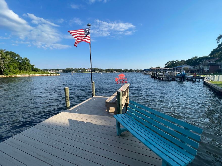 THIS IS THE ONE! Completely Renovated WATERFRONT HOME on Cinco Bayou! No Flood Insurance Required and NO HOA!  4 bdrm/2.5 bath (plus additional half bath in garage), 2600 sqft all BRICK, single story on .63 acres with huge rear deck to enjoy the water views and dolphins! Open bay views and water views from every rear window! No carpet-LVP and tile flooring throughout, quartz countertops, whole house generator, 2-tankless water heaters, 2-HVAC units, hurricane windows and sliders, boathouse dock and over 100ft of newer seawall, 2022 roof, too many upgrades to list them all!  Only a 15 minute boat ride to crab island! A MUST SEE!