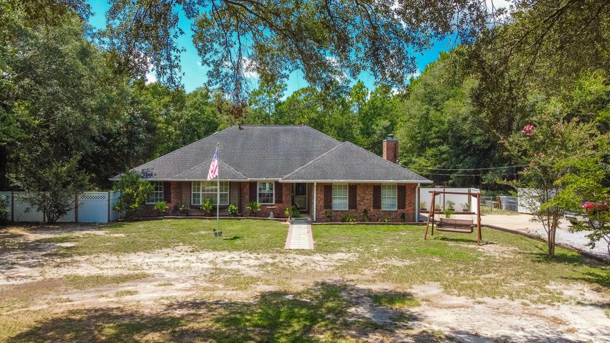 Where Country &City life collide. This 3BR/2BA  Beautiful Brick Home, with a sparkling in-ground pool, is nestled on a 1.2 acre lot. It is half mile to the new Publix Shopping Center& New Medical Center.Beyond the blueberry orchard, are  fig,plum,&apple trees.This home so many recent upgrades to include: Newly painted inside & outside,new blinds,new SS appliances,new custom cabinets & counter tops,recently remodeled BA rooms,new lighting inside & outside,new ceiling fans,new fencing around the pool& blueberries,new pool robot which conveys & new gas logs in the FP & more! The  50 galH2O heater installed 2018 , HVAC installed 2020 & a new roof is ordered and will be installed prior to closing. If you are looking for your private Oasis, in the city, look no further, It's right here!