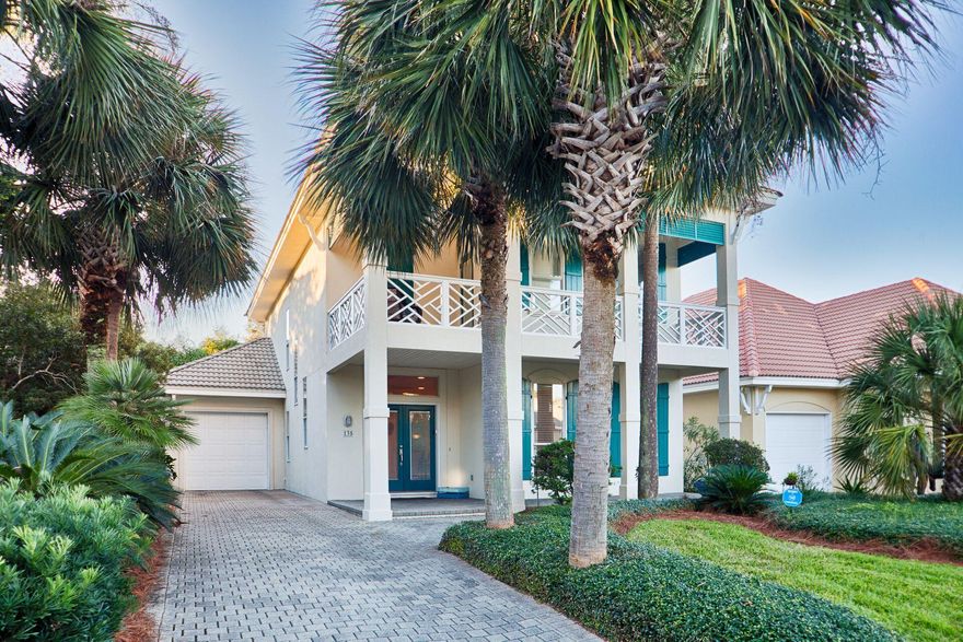 Charming, delightful, and peaceful, only begins to describe this Destiny West retreat. Enjoy as the perfect permanent residence, a second home, or capitalize as a vacation rental with proven income. The entry introduces a large open floor plan with captivating views extending to the inviting screened porch to the lush garden beyond. The home is well appointed with travertine flooring, extensive crown molding, a cozy fireplace, plus a spacious kitchen with granite countertops, stainless steel appliances, decorative tile back splash and breakfast bar all combine to delight any chef. Entertain with ease through a pass-through window to the back yard. The master bedroom offers a wraparound balcony for a great place to read or relax. The large master closet will not disappoint her majesty.