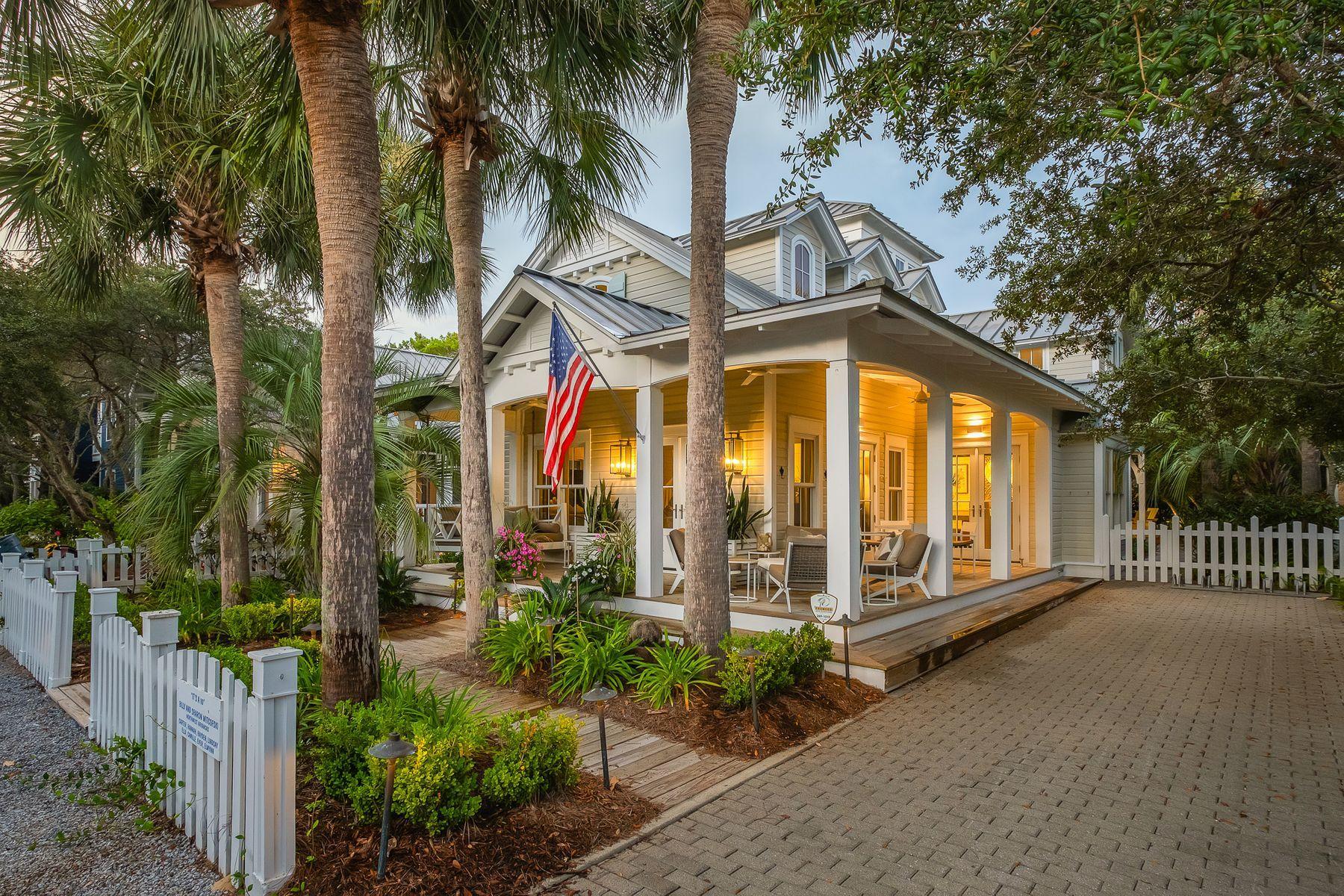 Primely located in the heart of Seaside, Florida, this beautifully remodeled beachside retreat designed by architect Tom Christ, is characterized by elegant coastal contemporary design and close proximity to the Natchez Street beach access. Charming wrap around porches and beautiful gulf views define this iconic cottage which offers a spacious open floor plan situated on an oversized lot with room for an additional structure. Notable features include expansive vaulted ceilings and ample windows for optimal natural lighting, ship-lap adorned walls, gorgeous maple wood flooring and a sizable backyard with a fire pit, covered porch and curated garden.