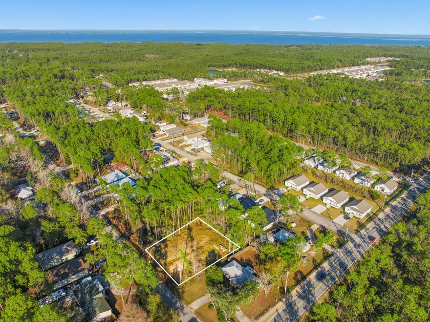 Discover the perfect coastal retreat with this 0.145-acre lot, ideally situated just 3 minutes from our stunning white sand beaches and only blocks from the bay boat ramp. Whether you're dreaming of a weekend getaway or a full-time residence, this property offers unbeatable access to both beachside relaxation and bayfront adventure. With its prime location and manageable size, it's a rare opportunity to own a slice of paradise close to the water.