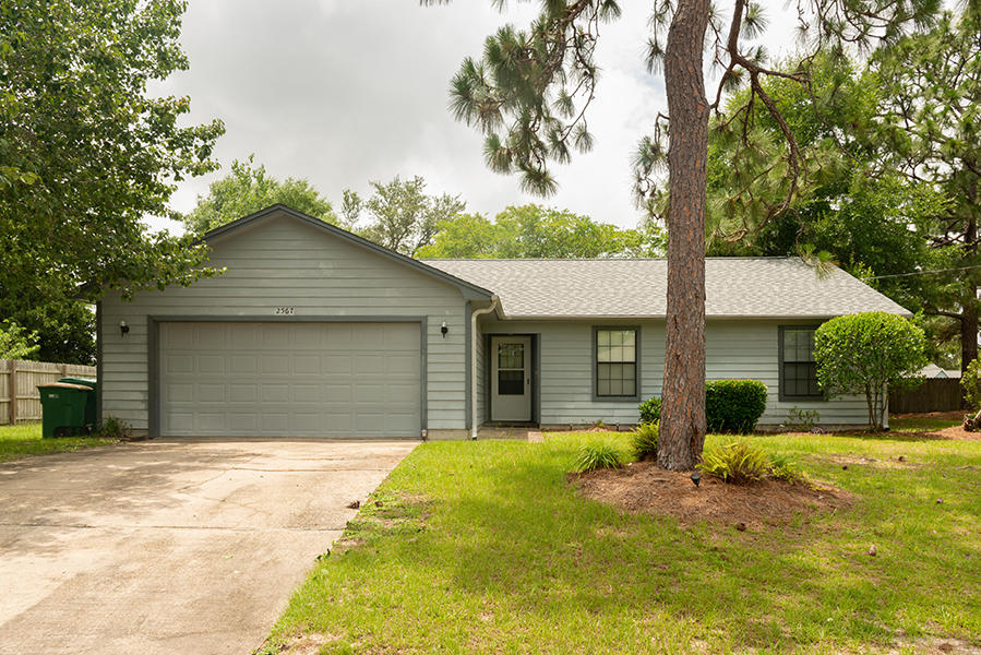 Open, spacious home features a fireplace, dining area, breakfast bar and a large yard. Nice deck in back. NO smoking allowed inside home or garage. Sorry NO PETS ALLOWED There is no fence at this home.