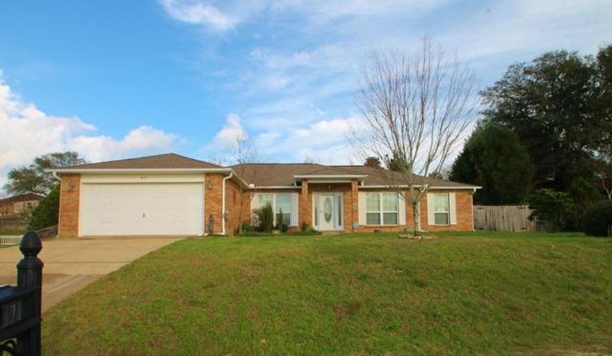 Immaculate all brick property in EXCELLENT condition with a great location south of I-10! FRESH INTERIOR PAINT! 2042 square foot split bedroom plan featuring 3 bedrooms, 2 full baths and a study that could double as a bedroom. Formal dining room plus a spacious breakfast room with a bay window! Lots of beautiful cabinets in the kitchen. Solid surface counter tops. Stainless steel appliances include a really nice refrigerator! Smooth surface range and microwave range hood. Large pantry. Huge multi-level deck in the back yard for entertaining. Built in grill and a fire pit! Double car garage. Like new carpet. Security system. Indoor laundry room. Nice landscaping. Westview is a popular location because of the proximity to the military installations, medical facilities, and shopping.