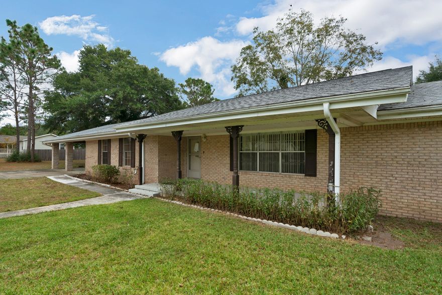 3 bed 2 bath Move In Ready Brick Home in Crestview. NEW Dimensional shingle roof. This home features a spacious kitchen with Granite Countertops, lots of counterspace, tile flooring and black appliances. There are two spacious living areas with one having a fireplace. This home has two bathrooms, one with a tub and shower combo, and another with a shower. There is a very large carport that would fit several cars. Enjoy relaxing and entertaining in the spacious backyard with a brick accent. This would be a great home for a new homeowner who wants to put their own finishing touches on their home and still have a lot of equity. Own this home for much less than rent! Could be Less than a $1,000/mo payment. Contact your agent and come tour this property today!