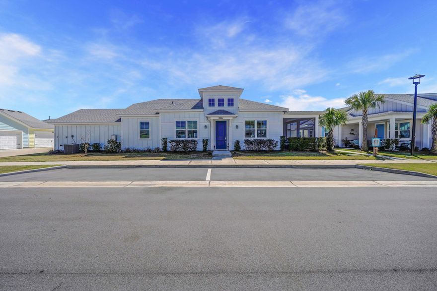 New price and motivated sellers!  Welcome to this exquisite, desired end unit cottage at Latitude Margaritaville Watersound! Open the door and you will want to move right in! This beautifully updated cottage features quartz countertops throughout, upgraded and soft-close cabinets, pull-out drawers, crown molding over the cabinets, double oven and more. Enjoy the luxury of enhancements sellers added after close, including LVP flooring throughout, plantation shutters, remote control ceiling fans, and modern light fixtures. The spacious layout provides a bright and welcoming atmosphere, perfect for relaxing and entertaining. Enjoy your screened in porch, an ideal spot for more relaxing, reading, or hosting a meal or beverage with friends and family. The home's location provides convenient access to street parking for guests, as well as easy in and out of the two-car garage. This home is ideally situated within the Latitude Margaritaville Watersound community, where you can enjoy exceptional amenities including HOA-maintained lawn care, a paradise pool with beach entry, cabanas, tiki huts, a restaurant and bar with panoramic views of the Intercoastal Waterway, a state-of-the-art fitness center, a 75' lap pool, pickleball and tennis courts, bocce ball courts, a kayak launch, dog park, and walking trails. The community also features golf cart and biking paths, a bandshell for concerts, and an exciting calendar of parties, games, and live music. For boating enthusiasts, a brand-new public marina will soon be available, with easy access to West Bay, Choctawhatchee Bay, and the Gulf waters. Just minutes from the beautiful Panama City Beach and the lively Pier Park for shopping and dining, this home offers the best of both relaxation and recreation. Whether you're enjoying quiet time at home or participating in the many community activities, this residence is the perfect space for both tranquility and excitement. Don't miss the chance to live in one of the most desirable 55+ communities around. Call today to schedule your showing!