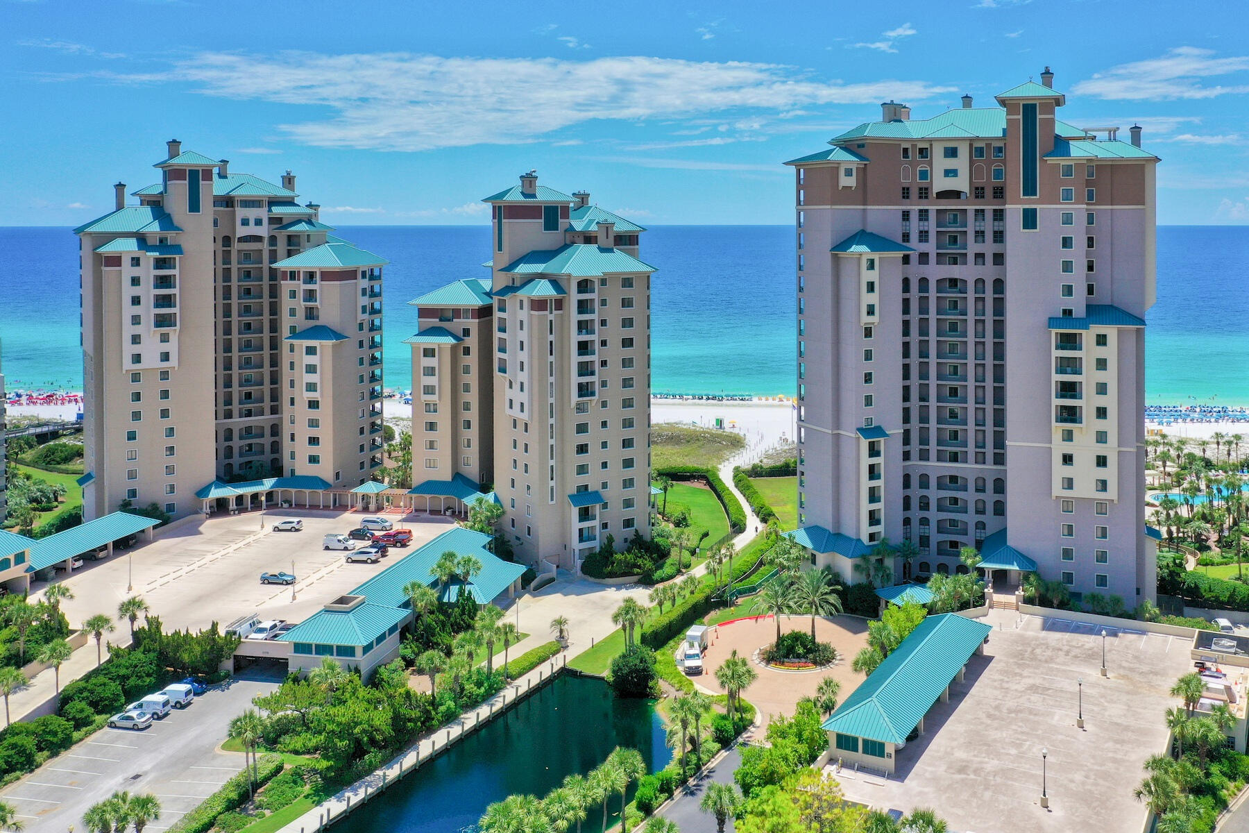 Panoramic Gulf front views from every room of this beautiful fifth floor, 3 bedroom, 3 bathroom home. Every bedroom has a gulf front balcony with the master bedroom having it's own private gulf front balcony. This home is resort living at its finest yet has a private feel from the moment you walk in the door. Custom pale aqua glass counters in the bathroom's which was meticulously designed and created by a Canadian artist who's vision was to bring the beauty of the Gulf inside. Floor and bath tiles are porcelain with glass finish making them glisten in the sunlight. The kitchen appliances are high end, with a new Sub-Zero Viking refrigerator, the kitchen and living room have spectacular views of the gulf. The two guest on-suite bedrooms are spacious and private.