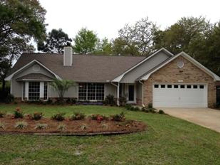 THIS HOME IS A MUST SEE! It has been tastefully remodeled, upgraded, painted throughout, and is move-in ready! Attention to detail is evident in every room. Manicured, professionally landscaped lawn with new pump and well irrigation system. Exceptional backyard is privacy fenced. The moment you walk in this house you feel you are home. The glass front door welcomes you into the home featuring a wood burning fireplace, remodeled eat-in kitchen, vaulted ceilings, designer light fixtures, Split floor plan, and a bonus sunroom/office. Lots of extras including new energy rated exterior doors, oil rubbed bronze door hardware throughout, touch on/off kitchen faucet, glass beaded wallpaper, under counter LED lighting, walk in master closet and MUCH MORE.