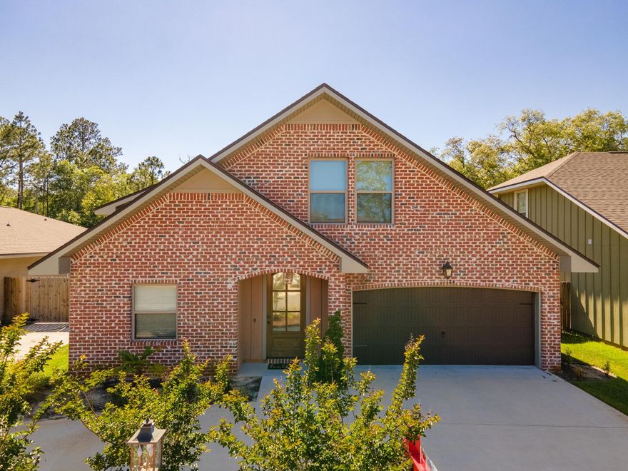 Welcome Home! Located in a private community, close to Uptown station, local shops, and restaurants. Don't miss out on this opportunity to make this home yours. Property is only 3 years young, with low HOA dues ($250 annually). Open concept floorplan, separate dining room area, gorgeous kitchen with stainless-steel appliances (commercial size refrigerator), many upgrades including a built-in water filter system in kitchen sink, granite countertops, backsplash, recessed lighting, breakfast bar area, and crown molding. Split floor plan with master bedroom downstairs, with two walk-in closets, two sinks, bathtub with jets and a stand-up shower. Remaining bedrooms are located on the second floor, great size closets and two full baths.