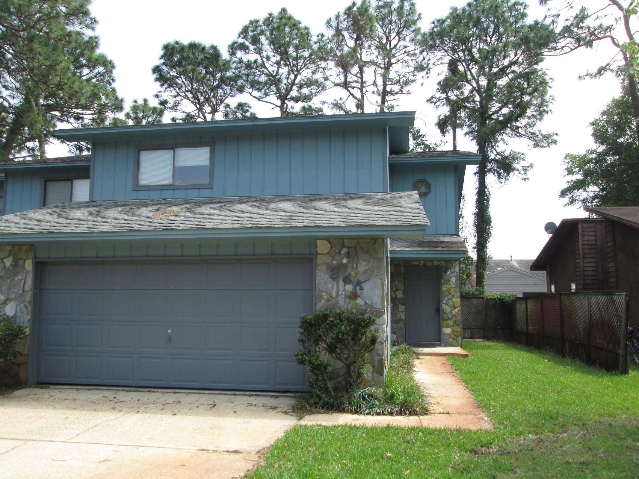 Nice townhome with a great location! . The living room boasts a lovely vaulted ceiling with skylights: open and bright! A convenient half bathroom is located on the first floor and both full bathrooms are located upstairs, along with both bedrooms. On the second floor, you will also find a loft area which also can be used as an office. The second bedroom also has a balcony overlooking the backyard. After a long day, relax in the screened porch. The backyard is also fully privacy fenced. This home is conveniently located close to shopping, schools, and Eglin AFB.