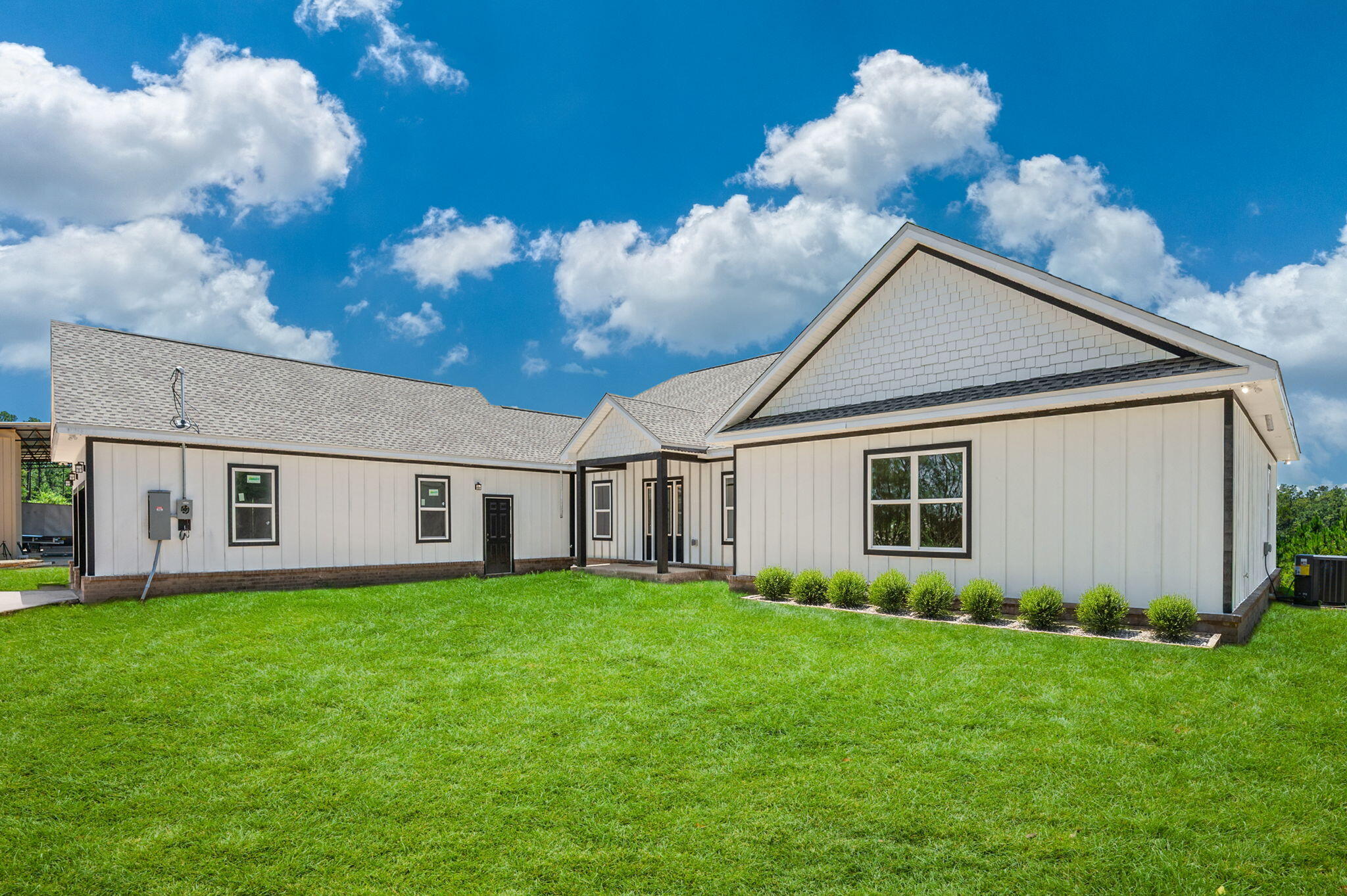 Welcome to your brand new custom farmhouse retreat on 12 stunning acres This charming home features 4 spacious bedrooms and 3 bathrooms. Each and every aspect of this home has been designed for comfort, style, and functionality. It boasts a bright open-concept layout and a a gourmet kitchen .with a large center island and stainless steel appliances. It has beautiful LVP flooring through out the entire home. This property also has a massive 30x 60 pole barn.Outdoors enjoy the endless possibilities of your 12 acre property. Perfect location for horses, gardening ,or just soaking in the serenity of this location as it is adjacent to the blackwater forest.