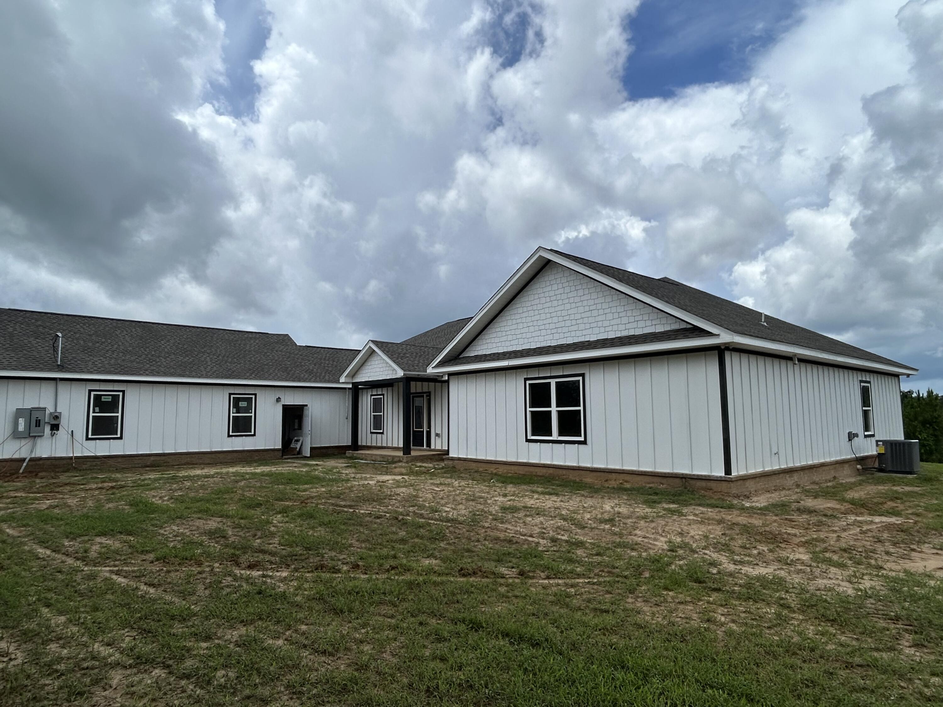Welcome to your brand new custom farmhouse retreat on 12 stunning acres This charming home features 4 spacious bedrooms and 3 bathrooms. Each and every aspect of this home has been designed for comfort, style, and functionality. It boasts a bright open-concept layout and a a gourmet kitchen .with a large center island and stainless steel appliances. It has beautiful LVP flooring through out the entire home. This property also has a massive 30x 60 pole barn.Outdoors enjoy the endless possibilities of your 12 acre property. Perfect location for horses, gardening ,or just soaking in the serenity of this location as it is adjacent to the blackwater forest.