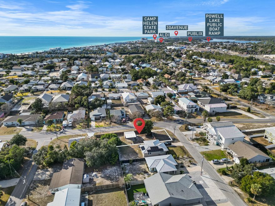 Looking for the perfect opportunity to build your dream beach retreat? This prime corner lot at Kelly St. and Marlin Ave. on the sought-after West End of Panama City Beach is just 0.4 miles from two public beach access points--Access 87 & Access 88--offering easy access to fantastic beaches. With no HOA fees, you can create your ideal coastal cottage. The West End is experiencing exciting new developments, making this location a smart investment for those looking to be part of a growing community. Quiet beaches, multiple access points, a golf-cart-friendly community, and a laid-back atmosphere make this lot an exceptional find. Contact me today for more details! The sale includes an empty storage building, providing additional space for your beach gear or future plans. Don't miss this chance to build your sandcastle.

The home site is adjacent to this empty lot at 21823 and will be listed for sale separately if you have been looking for a double-lot opportunity. If you have been looking for a double-lot opportunity, you can utilize the existing cottage, maximize your outdoor living space on this empty lot, demo the home, and build your beach retreat across both lots.