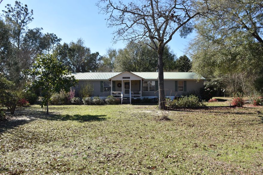 Affordable home in a popular neighborhood, outside the city limits so no city tax! Seller will credit $3,000 toward your closing costs at closing! Situated on a level 1.5 acres, this home boasts plenty of room for a garden or other outside activities; let's play ball! Spacious home has a split bedroom floor plan and a cathedral ceiling over all the rooms. Corner Fireplace accents the Living Room. All Bedrooms have walk-in closets; Master Bedroom has an extra closet. Kitchen is fully equipped with all Appliances; Washer and Dryer are included. Front and Back Porches give morning and afternoon options to enjoy your outdoor spaces. Workshop/Shed is a great place for your projects and lawn equipment. Decorative fencing lines the front yard. New HVAC system in 2017. ''MORE'' for additional info