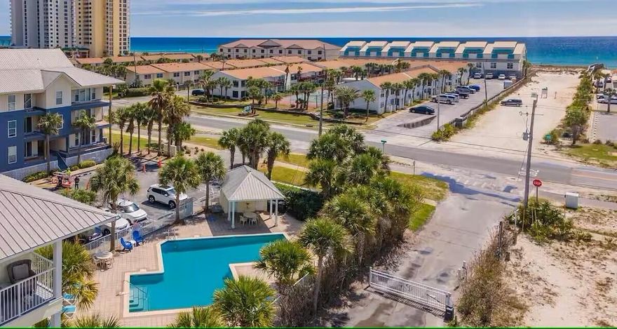 Welcome home to this charming 1-bedroom, 2-bathroom condo, just steps from the pristine white sands of Navarre Beach and nestled between two breathtaking bodies of water, offering random wildlife sightings and easy access to nearby restaurants and entertainment. Enjoy stunning, unobstructed views of the Santa Rosa Sound and distant, tranquil glimpses of the Gulf from your bright and airy open-concept living space, designed for ultimate relaxation. The primary suite features new carpeting, a private bath, and a full-size closet, while cozy twin bunks and a queen-sized sofa bed provide ample sleeping accommodations. A full-size hall bath adds extra convenience. Step onto your private balcony, complete with updated slider doors and exterior lighting, and unwind as you take in the breathtakin  sunsets a picture-perfect way to end each day. HVAC Recently installed 2023! More than just a peaceful beach retreat, this condo is also a lucrative investment with a strong $48K rental history, top-rated reviews, a substantial client database, and promising projections. Offering exceptional short-term rental potential, it's the perfect opportunity to generate income while indulging in the paradise lifestyle. Located just a short distance from beach access, local restaurants, coffee shops, and all the best attractions Navarre Beach has to offer, this prime location is truly unbeatable. Whether you're searching for a personal getaway or a high-performing rental property, this condo is the perfect choice. Call your favorite Realtor today for more information!  
