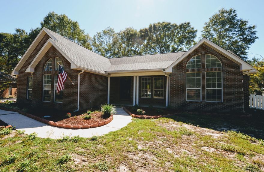 This simply gorgeous home is ready for you! A dazzling home in the ever popular Live Oak Church area, this 3bedroom 2bath split bedroom design home comes with wow factor. Home has new dimensional shingled roof, new HVAC, new Gas Water heater, granite tops, appliances, fixtures, custom built all wood kitchen cabinets, and more. Eclectically designed, the 3 sided fireplace is the center piece of the kitchen view, living room, and dining area. Bedrooms have carpet and the remainder of the home has matching wood look tile. Maximizing space in the master, a pocket door leads to the stunning master bath which boasts a triple shower tiled walk in shower, private toilet room, double vanity and huge walk in closet. To say this one is a must see is an understatement. Call today before it's gone!