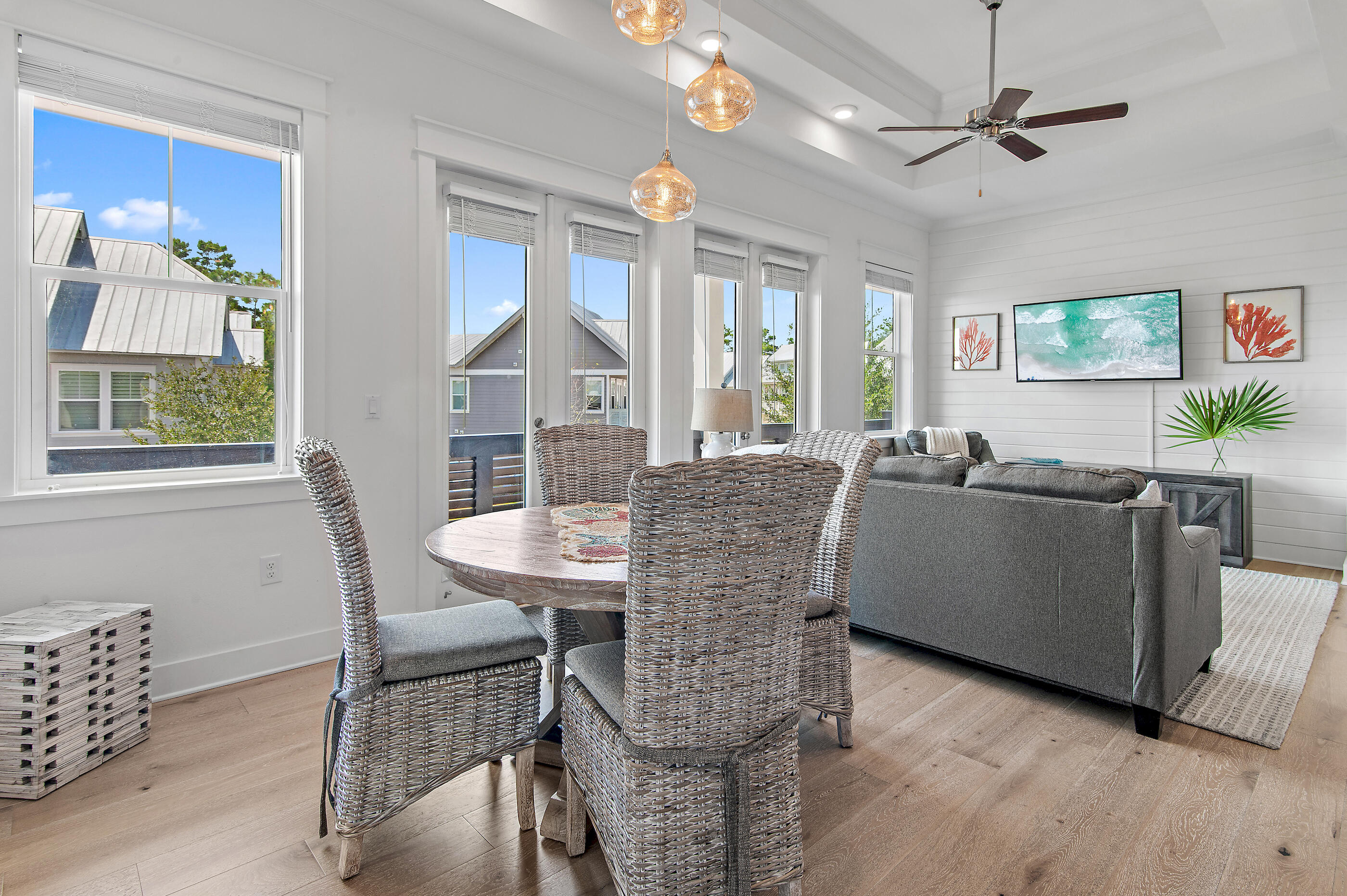 Prominently positioned in the resort-style community of Prominence on 30A, ''Shell Yeah'' seamlessly blends luxury accommodations with inviting coastal charm. Upstairs, the heart of the home welcomes you into a sophisticated living space thoughtfully designed for both relaxation and entertainment. Abundant natural light and warm wood tones create a serene coastal ambiance. The gourmet kitchen showcases stunning Crystal Ice quartz countertops, a premium stainless-steel appliance package with a gas cooktop, and an extended island with integrated seating. The spacious primary suite, bathed in natural light, features a custom tray ceiling and picturesque views of the lush green space. Its spa-like ensuite boasts a double vanity, a walk-in closet, and a beautifully tiled walk-in wet room.
An additional guest room currently configured as a bunk room with a trundle along with a full bath and laundry, complete the second level.
Nestled in the sought-after community of Prominence, homeowners and guests enjoy access to two resort-style pools, community grills, walking trails, open green spaces, and The Big Chill, home to some of the area's top dining and entertainment venues. This fully furnished unit boasts numerous updates and premium upgrades, including Integrated UV air filtration in the HVAC system, accent walls, bathroom glass enclosures shiplap surfaces, upgraded countertops, and a newly epoxied and sealed garage floor, among many other enhancements. With impressive rental potential annual revenue projections between $60,000 - $80,000 a year and its turnkey, fully furnished configuration, 146 Pine Lands Loop #C presents an outstanding opportunity for investors and those seeking a second home or full-time residence. Schedule a private viewing today and start living the coastal lifestyle you deserve!