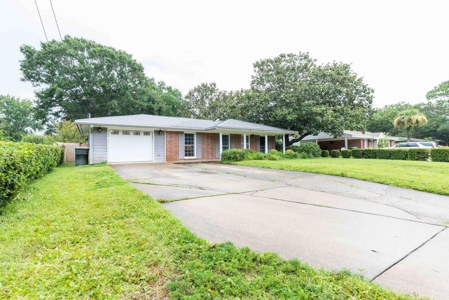 This home has everything! Pool, garage, updated, matured yard,& backs up to the school. The neighborhood is quaint and has a park within walking distance. The pool is salt water gunite and a detached hot tub to top that off! Within the last 5 years the back porch roof was raised to add an architectural design and to really accent the back yard oasis. The hot water tank is newer, a.c. regularly maintained, and the attic has extra insulation to top it off! It's a must see!!