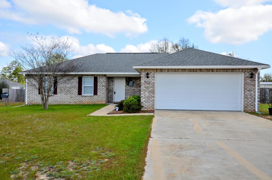 Stop! This is the home you've been looking for. Tons of wow factor in this affordable newer home just minutes from Crestview and Hwy 285, Fedex and more. This 4 bedroom 2 bath split bedroom home has over 1400sf making it one of the larger homes in the Triple Lakes; The Pines subdivisions. Home rests on an oversized double corner lot. Yard is level and back yard is privacy fenced. Indoors you will need to do nothing on move in day as this meticulously cared for home has updated laminate flooring in all rooms and matching tile in kitchen, baths, and laundry areas, neutral paint and comes with matching microwave, smooth top stove, dishwasher, microwave and Side by side fridge. This one will not last and is a must see - so put this one on your short list and call today!