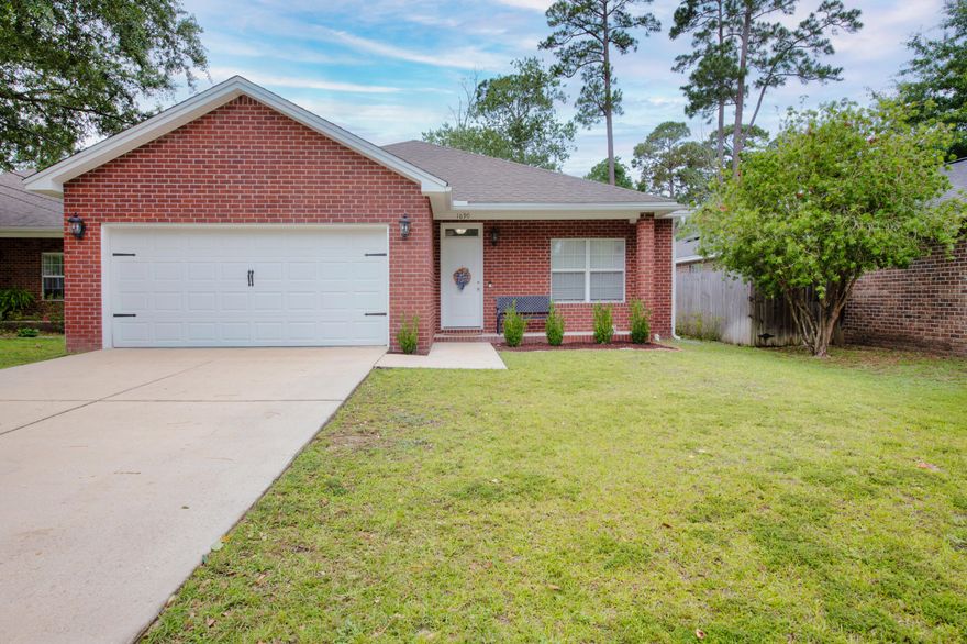 Located in the Heart of Niceville, this 3 bedroom 2-bathroom with 2 car garage home offers plenty of space! As one enters the home to the right is a well sized coat closet. The home opens up into a large open concept living area with wood floors. The living area leads to the dining and well sized kitchen! The kitchen features granite countertops with a bar area, and stainless-steel appliances! As one continues through the home they will have the primary bedroom, along with a large primary bathroom. The bathroom has double sinks, tub/shower combination, walk in closet, and additional storage. closet! The additional two bedrooms are well sized along with an additional full bathroom! Continue on to the screened in back porch, and through to a large, fenced backyard! Schedule a showing today!