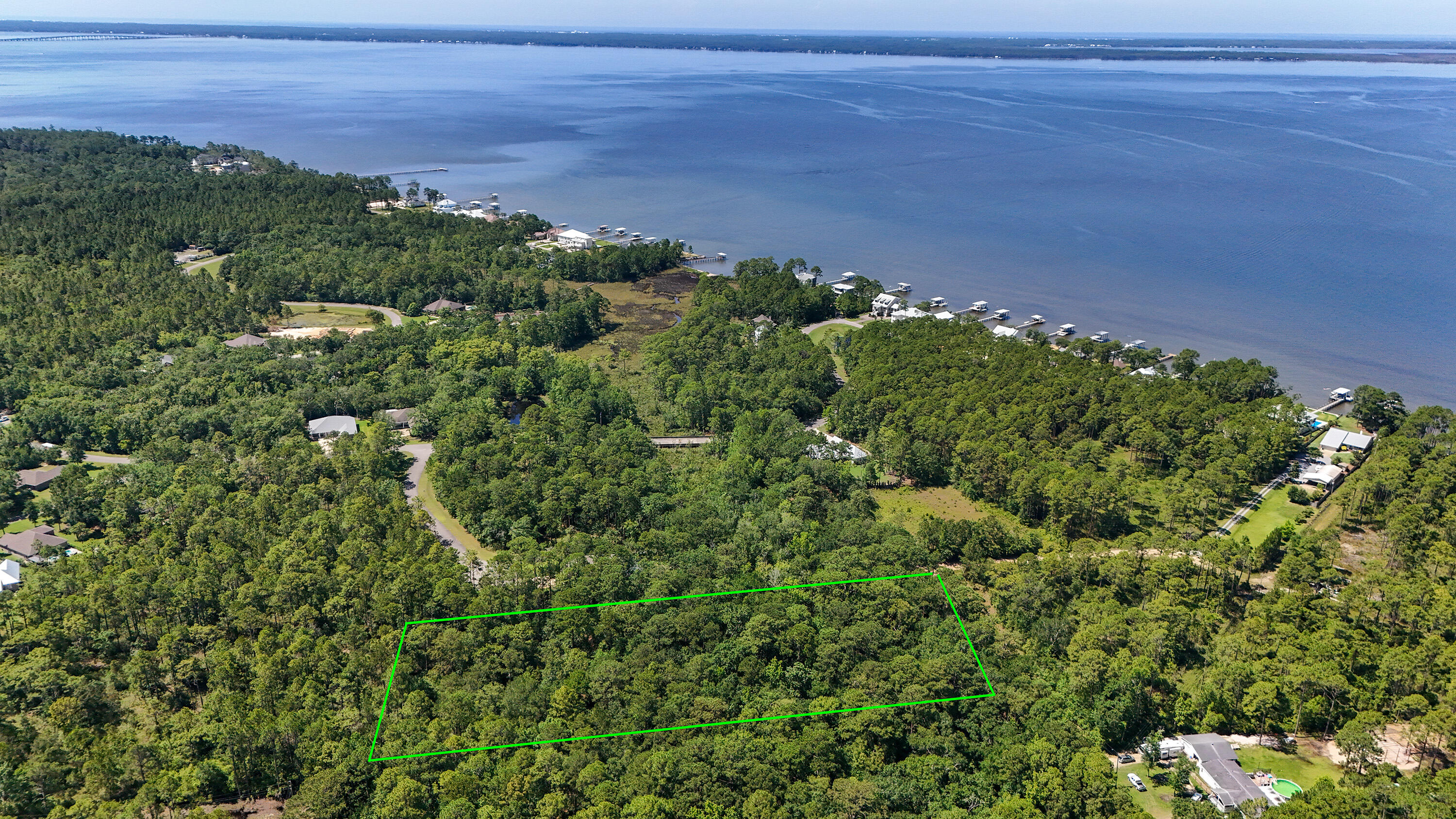 Discover the perfect blend of natural serenity and convenience with this stunning 4.66-acre wooded parcel on Watson Road in Freeport, Florida. Nestled right off Bay Loop Road, this picturesque property offers a serene escape surrounded by the beauty of Florida's lush landscapes. Whether you dream of building a private residence tucked away among nature or envision developing a tranquil retreat, this land provides an ideal canvas.Surrounded by mature trees and abundant wildlife, this property offers ample opportunity for outdoor activities and exploration. Imagine waking up to the sound of birdsong or spending your evenings enjoying the peaceful ambiance of your own wooded sanctuary. Despite its secluded feel, this property is conveniently located near local amenities, schools, and just a short drive from the emerald waters of the Gulf Coast.
Don't miss this unique opportunity to own a substantial piece of land in the growing community of Freeport. Whether for personal use or investment, this property is a prime piece of real estate ready to accommodate your vision. Contact an agent today to explore this beautiful acreage and discover the endless possibilities it holds!
