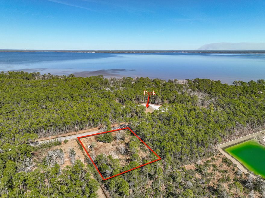 Hey dream builders! Picture this: your very own custom-built paradise on 1.67 acres. This isn't just land, it's the starting line for the home of your dreams. Capture gorgeous sunsets over the Choctawahatchee Bay or for you water lovers, Kellogg Park is just across the street,  A 10-acre park with a ramp, ideal for fishing, kayaking, and paddle boarding.  The park also offers several picnic tables, shower, water fountain, and more. Oh, and here's the cherry on top - you're only 4 miles from the legendary 30A and Ed Walline public beach access.
