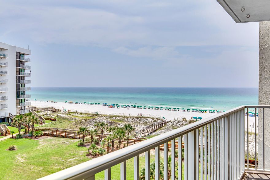 STUNNING 2 bedroom, 2 bath condo with a fabulous view of the emerald green water and beach. Access balcony both from living room & master bedroom to enjoy the sound of the waves & the gulf breeze. Beautiful Mexican style tile throughout with carpet in the bedrooms. The kitchen is well equipped. Other great features are new plantations shutters, crown molding throughout, granite counter tops in kitchen and bathrooms, & owner's closet. HVAC replaced April 2021. Washer/dryer & dishwasher replaced 2020. New slider doors. Mainsail is a gated community with amenities that include: 700 feet of deeded beach, two pools, tennis courts, basketball court, shuffleboard courts, fitness room, covered parking, & courtesy security patrol. Conveniently located by Scenic Gulf Drive across from Silver Sands