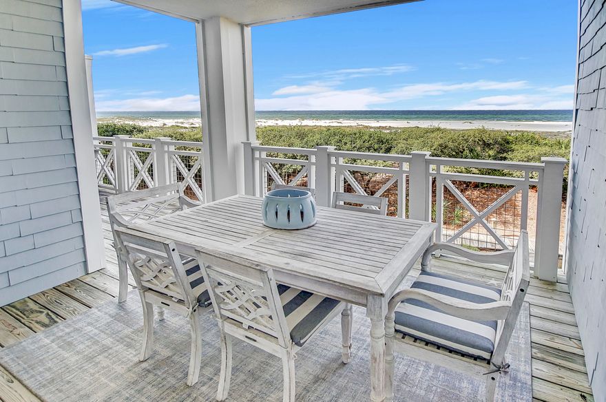 With new furnishings, updated kitchens and beautiful bathrooms, this gulf-front condominium at The Crossings in WaterSound Beach offers the perfect blend of modern amenities and serene living. Refinished hardwood flooring and coastal decor harmonize with the unspoiled setting in this two-level residence, which lives like a beach house with the convenience of a condo. The main living/dining area is on the second floor and flows out onto a decked balcony where a covered dining area and open sitting area overlook amazing views. It's a place to relax and breathe in the fresh sea air while everyday stress melts away. Wainscot walls and feature lighting enhance the sitting room, while the gourmet kitchen is stylishly appointed White cabinets, a gleaming glass tile backsplash and stainless steel appliances complement the cool quartz countertops and farmhouse sink. A newly added wine bar provides a dedicated space for serving chilled wines and sunset cocktails best enjoyed on the covered porch. A sliding barn door feature hides a private office /den with built-in cabinetry, and there's additional storage in the walk-in pantry and laundry room. Comfort and luxury abound in all three tastefully appointed bedrooms with newly renovated private bathrooms. The bright primary suite has French doors with plantation shutters leading onto the balcony for peaceful morning views before breakfast. Mature trees frame views of the emerald Gulf of Mexico, gently lapping the white sandy beach. The master bathroom is a haven of luxury with mirrored walls, gray cabinets and a freestanding oval tub. A spacious walk-in closet boasts custom California Closets, including hanging rails, drawers and abundant shelving. This immaculately maintained home has only ever been used as a second home and has never been rented. It benefits from an attached garage and a dehumidifier installed on the second-floor HVAC. Overlooking the pristine dunes, this luxurious home is in a highly sought-after location with boardwalk access to the private beach. There's a pool exclusively for owners and guests at The Crossings. The wider WaterSound community offers miles of walking trails and boardwalks, a dog park, playground, puttering park, fitness center and additional community pools, all immaculately maintained. 