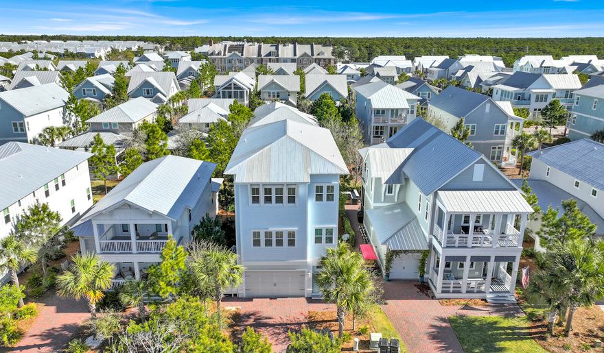 Just a short stroll from the exclusive members-only Watersound Beach Club, this coastal retreat enhances its appeal for those who cherish access to premier amenities. This beach house is an ideal sanctuary for those seeking a luxurious, convenient, and relaxing coastal lifestyle. Beautifully decorated and meticulously crafted, the home embodies the essence of Southern living and beachside relaxation with features that showcase an unwavering attention to detail and high-quality craftsmanship, including shiplap and crown molding, 8-foot doors, and 10-foot ceilings.Large windows and porches on all three levels bathe the interior in natural light and offer ample opportunities to savor the picturesque views. An elevator ensures easy access to all floors, making it a convenient choice for those needing mobility assistance. The residence includes four bedrooms, featuring two master suites, one located on the first floor and another on the third, providing both flexibility and privacy for occupants or guests. The chef-inspired kitchen and expansive great room create a perfect environment for entertaining. Additionally, this home comes fully furnished, offering a turnkey solution for those looking to move in without the hassles of furnishing a home.
Located within the Prominence community, residents enjoy access to resort-style pools, a fitness center, and just minutes to the nearby Deer Lake Park Beach Access. The home's proximity to The Big Chill offers convenient access to additional shopping, dining, and entertainment options, further enhancing the convenience and appeal of this exquisite coastal home.