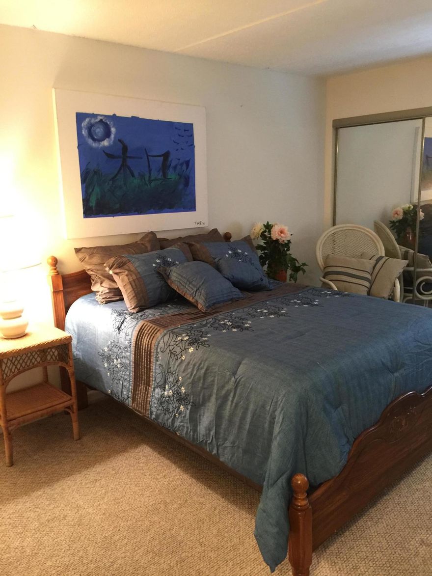 All new flooring throughout including hardwood in dining/living area and kitchen. Kitchen cabinets refurbished to reflect stressed decor. Bedroom carpeted. Tile in bathroom. Freshly painted throughout. New heating and cooling unit installed October 2013. Enjoy quiet evenings on the dock or by the pool. Great investment property or opportunity for owner to have their own piece of the sound. Unit has been very well maintained by meticulous owners. Priced to sell!!