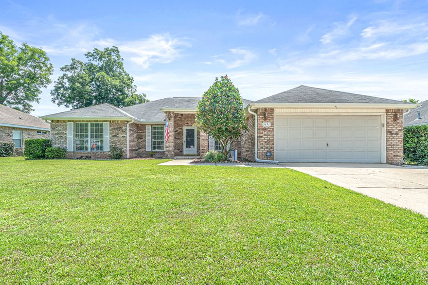 FLAT LOT! Beautiful spacious 4/2 Crestview home with an amazing yard. This home has been lovingly maintained and is ready for your family to make it your own. Home features a formal dining room, office, master with master bath with dual vanities, walk in shower, garden tub and his and her closets. The home also has BOTH huge kitchen with stainless steel appliances and living room. Separate interior laundry room that leads to the garage. Enjoy the split floor plan with three other bedrooms and a full bathroom on the other side of the home. Amazing screened in porch and patio for grilling. 10x12 metal shed and privacy fenced back yard. Two car garage with opener and gutters on home. Enjoy the community pool and tennis courts in this beautiful community. This home will not last long!!!