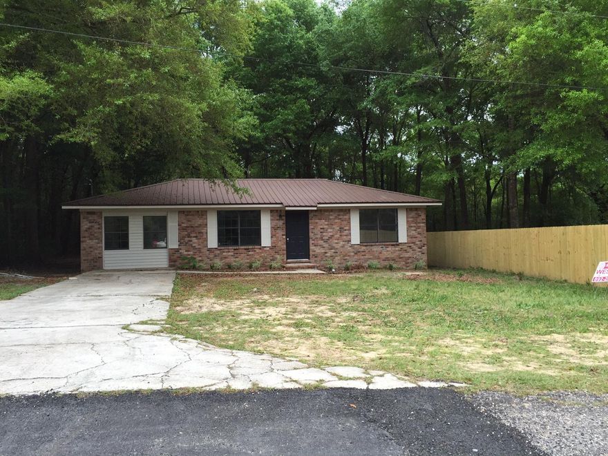 This house qualifies for 100% This beautiful all brick home that is like brand new. Seller has just installed all new laminated floors throughout, baths and laundry ceramic tile floors. New cabinets and counter tops. All new interior and exterior doors. Brand New Stove, refrigerators, dishwasher. Qualify today and being living for less than rent you are paying! It's ''turn key ready'' to move in. Close to Walmart, school and dining.