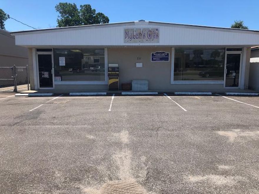 2,262 SF office/retail space centrally located on Walter Martin Road, just across from the Fort Walton Beach Post Office.  Property can be leased as a whole or half.  6 parking spaced located in the front and approx 10 fenced in, paved spaced in the back.  Property secured by ADT.